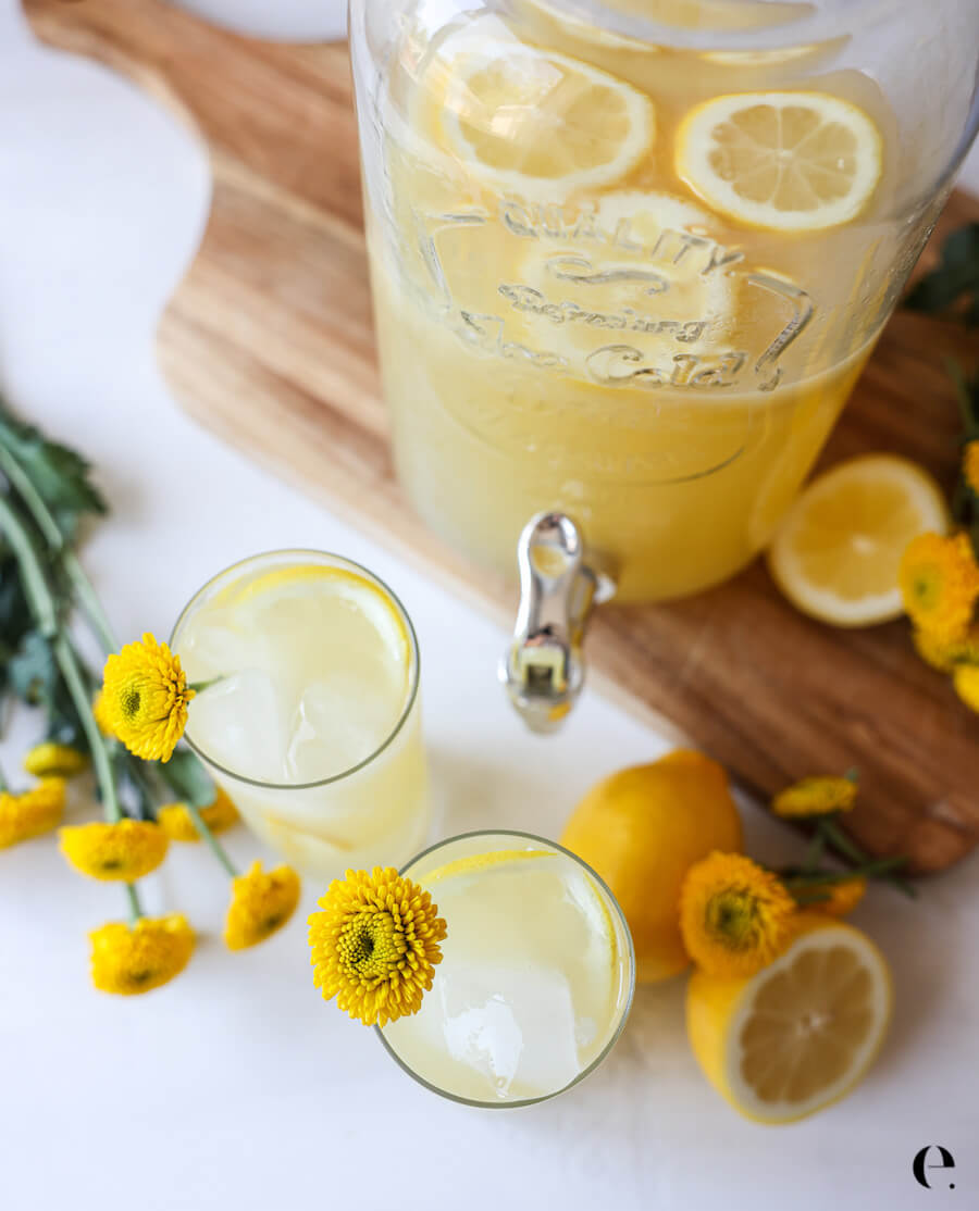 lemonade pitcher with lemons and flowers
