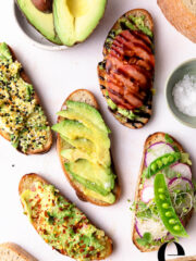 assorted avocado toasts with colorful toppings