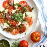 heirloom tomato caprese salad with mint basil pesto
