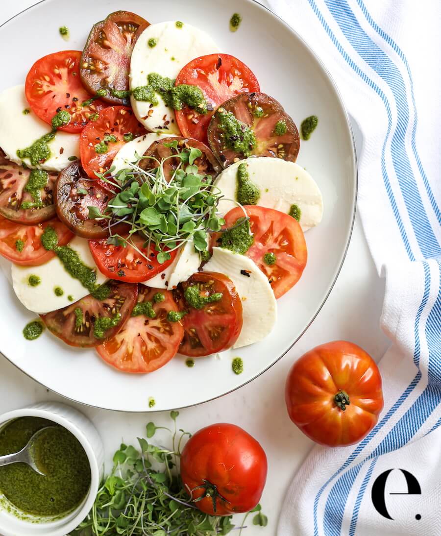 heirloom tomato caprese salad with mint basil pesto