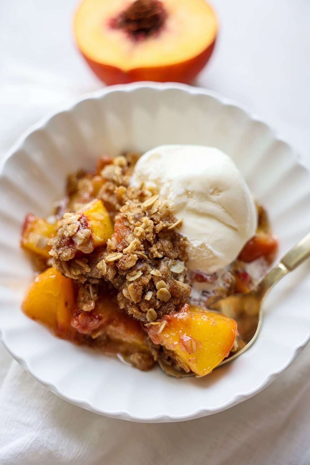 Peach Crisp Recipe with Ice Cream in Bowl