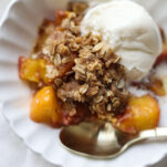 Peach Crisp Recipe with Ice Cream with Bowl Spoon