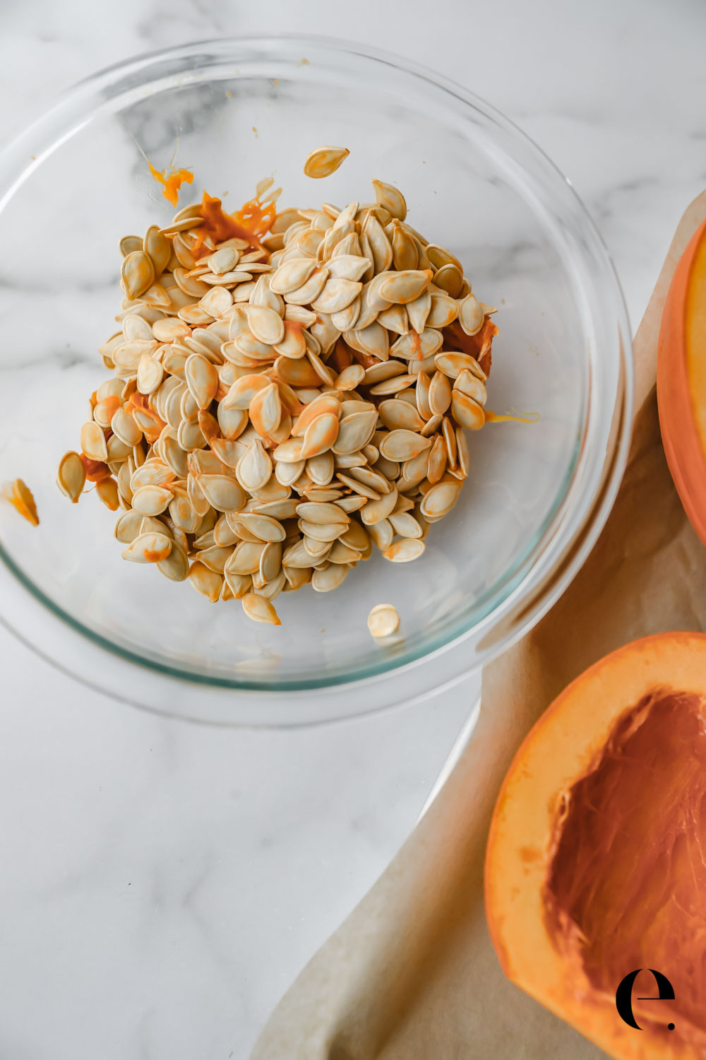 raw pumpkin seeds in bowl