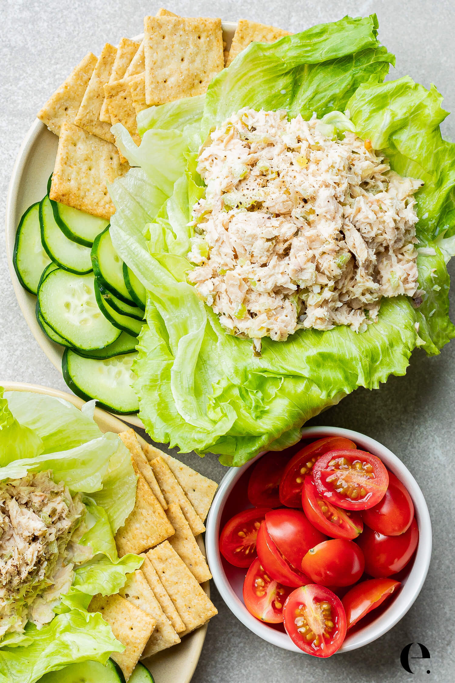 classic tuna salad with lettuce and crackers on plate