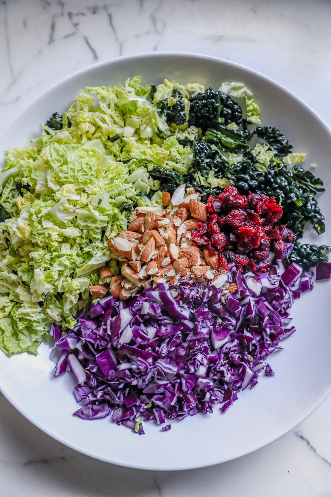 Fall Cabbage Salad Ingredients with Kale Crunchy Cabbage Almonds and Maple Dijon Dressing