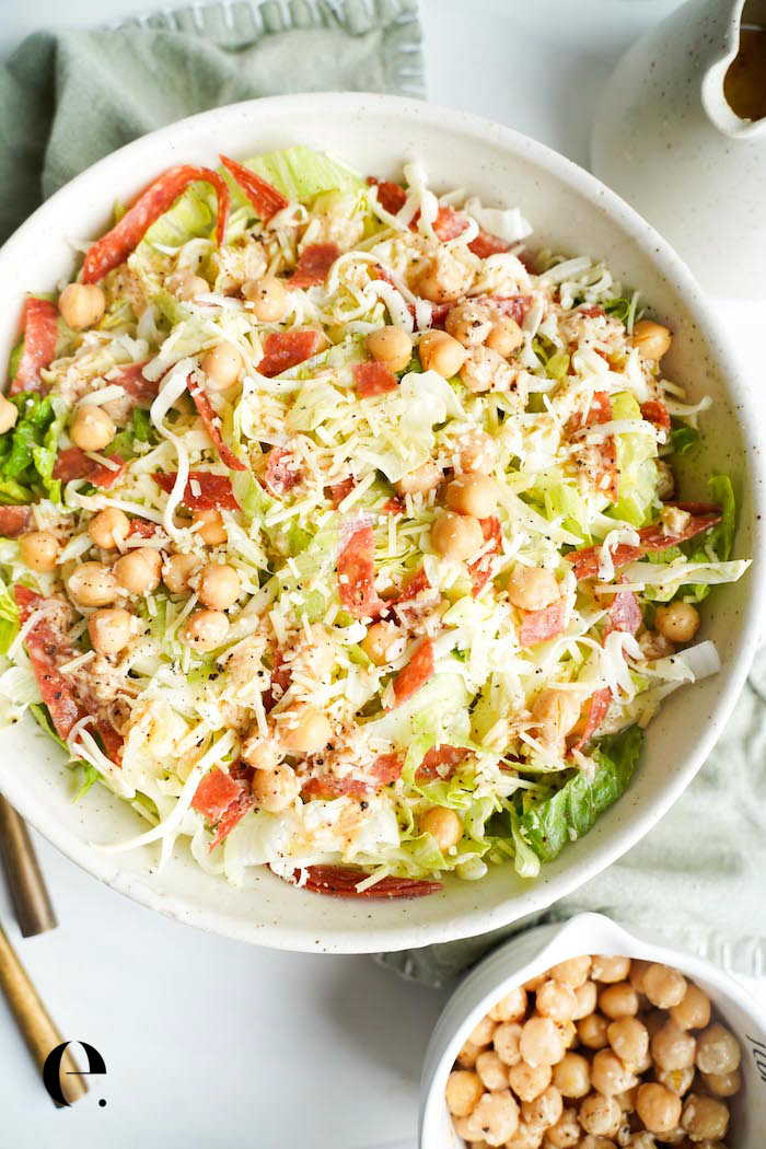 Close-up of La Scala chopped salad with finely shredded lettuce, strips of salami, shredded mozzarella and chickpeas