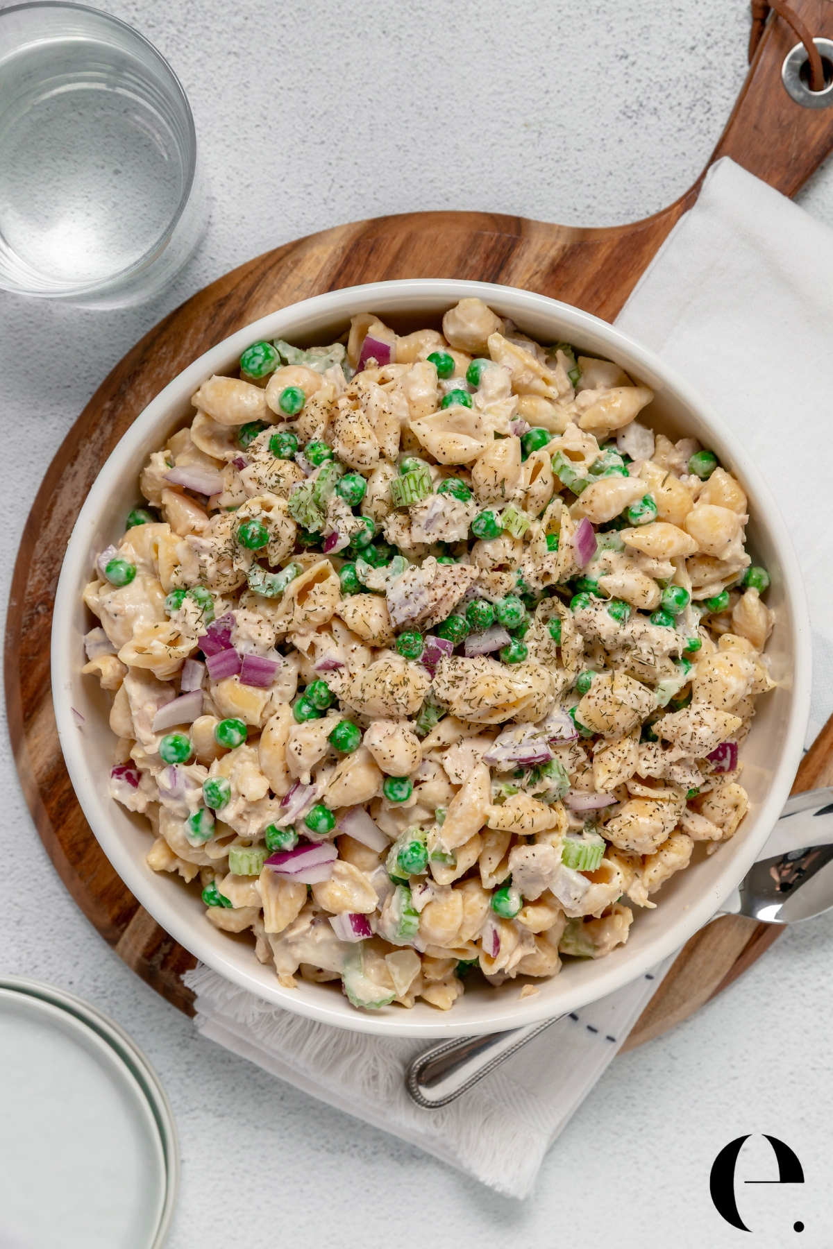 Easy tuna pasta salad recipe with lemon and dill, mixed and ready to serve